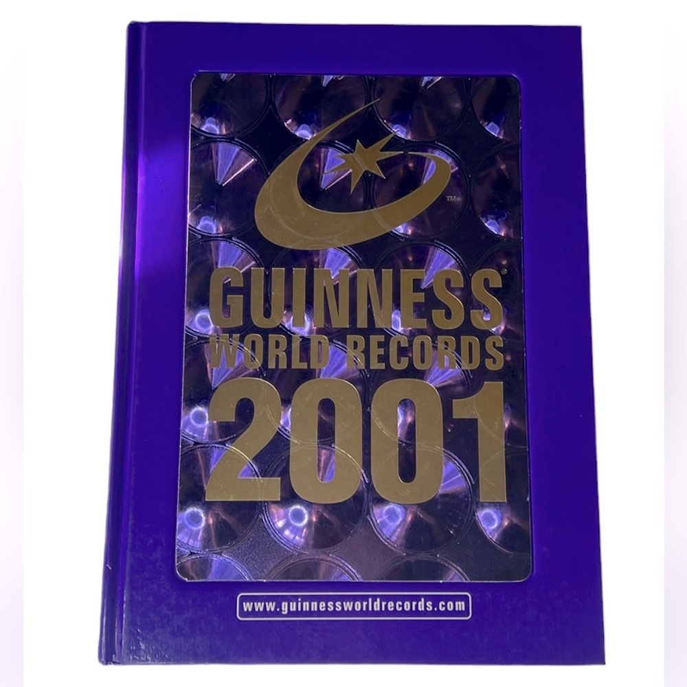 Guiness World Records 2001 Purple & Gold Collectible Book Hardcover